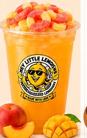 Paradise Peach lemonade โ Peach + Mango, topped with Peach Rings