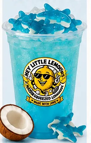 Shark Attack lemonade โ Coconut + Blue Raspberry, topped with Gummy Sharks